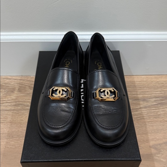 CHANEL Shoes - Brand new authentic CHANEL Black Leather Loafers with Gold CC Accent